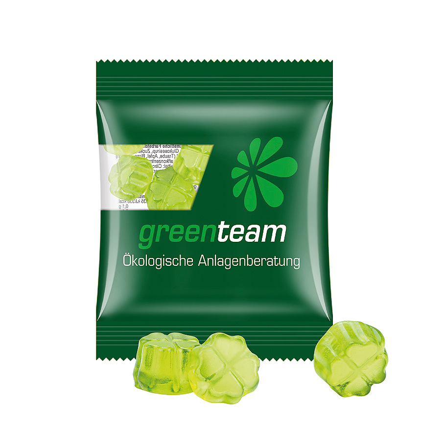 Mini bag 10g, compostable foil transparent, Trolli fruit jelly gums clover leaf transparentní - foto Trolli fruit jelly gums in a bag made of transparent foil, compostable, individually printed. Content: Trolli fruit jelly gums clover leaf green, in premium… transparentní - foto