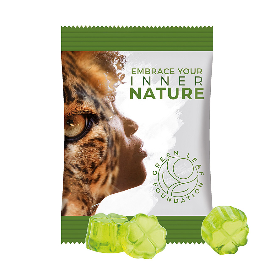 Mini bag 15g, foil white, Trolli fruit jelly gums clover leaf white - foto Trolli jelly gums in a bag made of white foil, individually printed. Content: Trolli fruit jelly gums clover leaf green, in premium quality with 10 % fruit… white - foto
