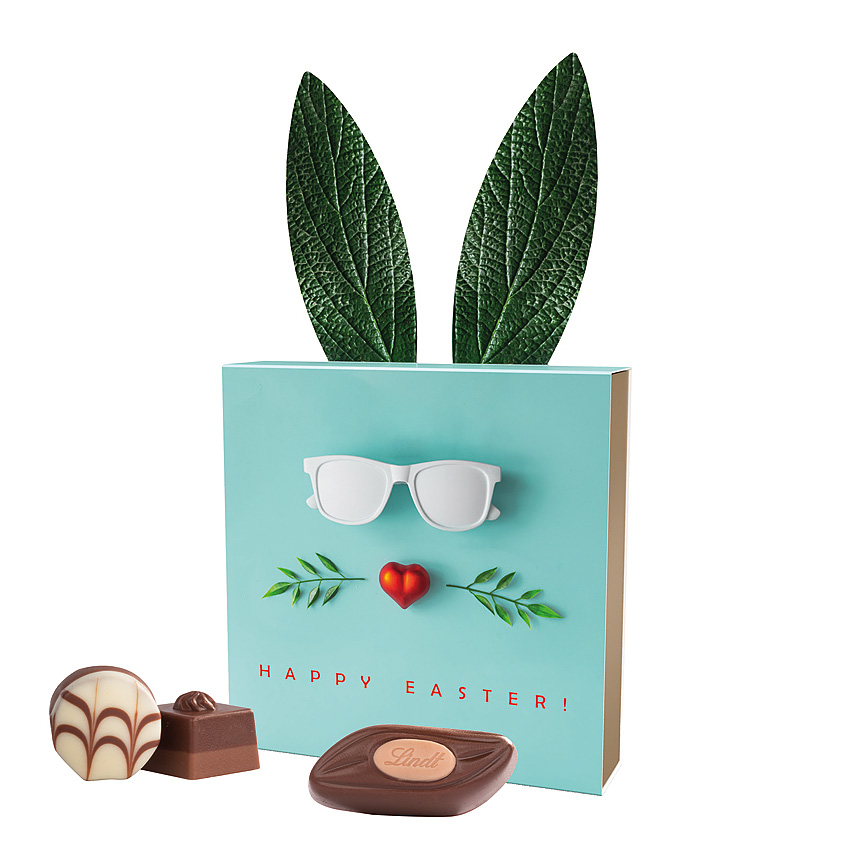 Lindt dárek, bílé lepenkové reklamní pouzdro „zaječí uši", Lindt Mini Pralinky - Lindt dárek, bílé lepenkové reklamní pouzdro „zaječí uši", Lindt Mini Pralinky -