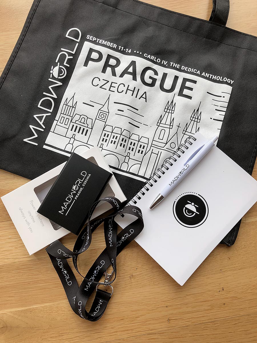 Reklamní konferenční sada Madworld Prague – taška, blok, pero a šňůrka na krk s potiskem