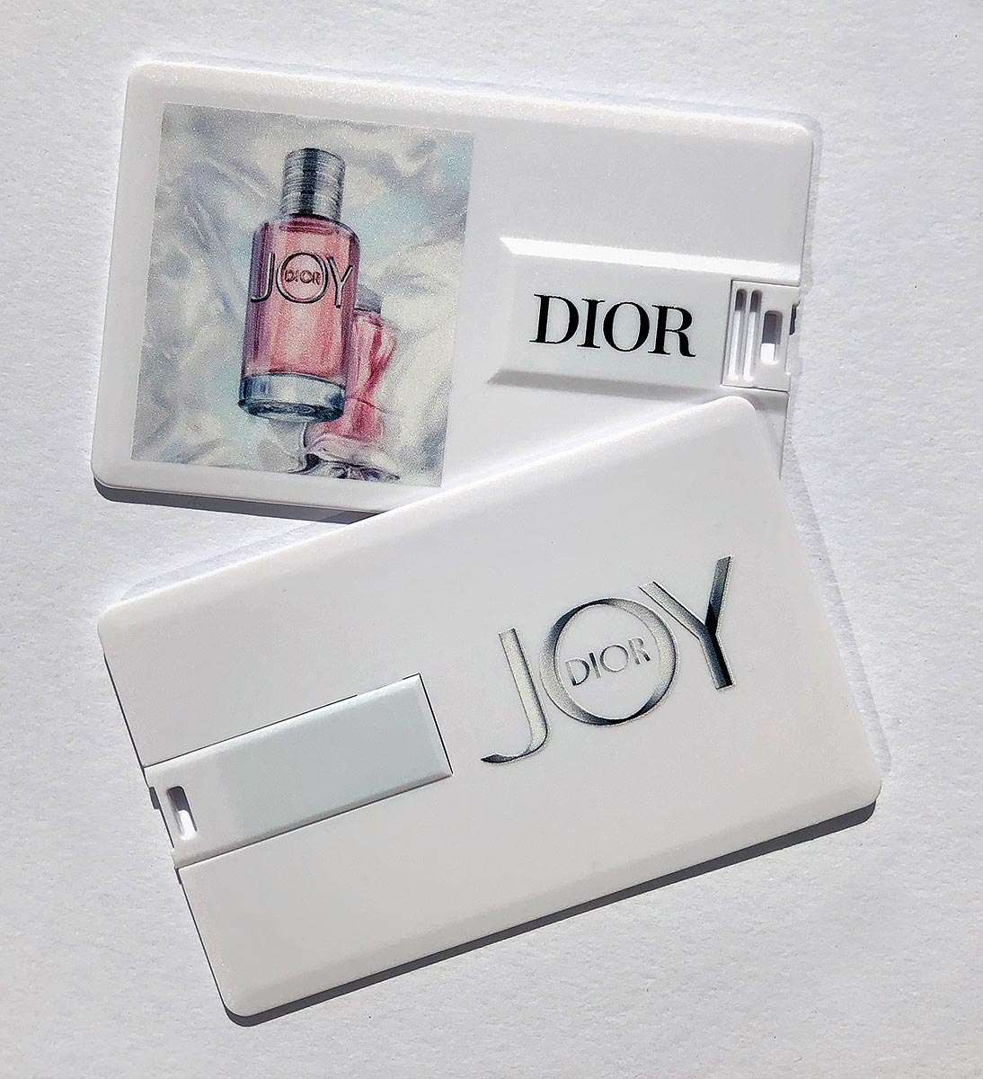 Reklamní USB flash disk ve tvaru kreditní karty s potiskem Dior Joy