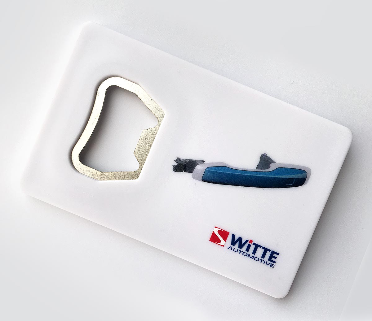 Reklamní otvírák na lahve ve tvaru kreditní karty s potiskem loga Witte Automotive